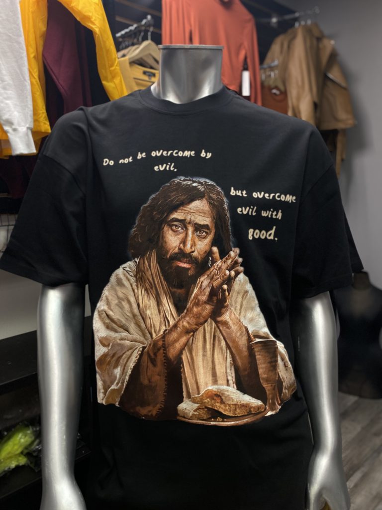 Direct to Garment or Digital Printing of graphic design on a black t-shirt.