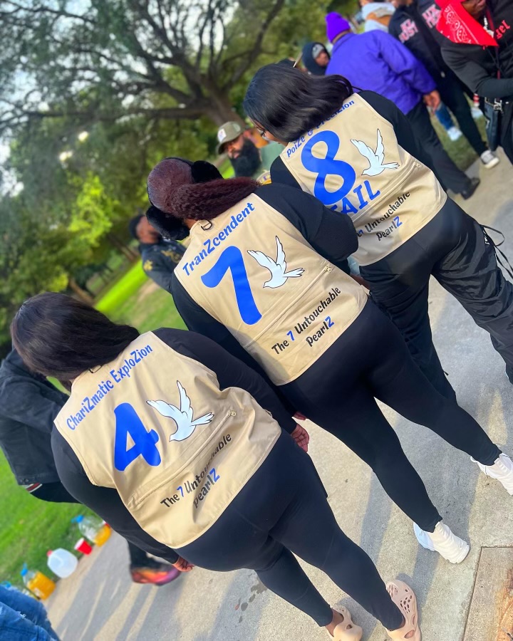Event staff wearing custom branded apparel during a community food and vendor event.